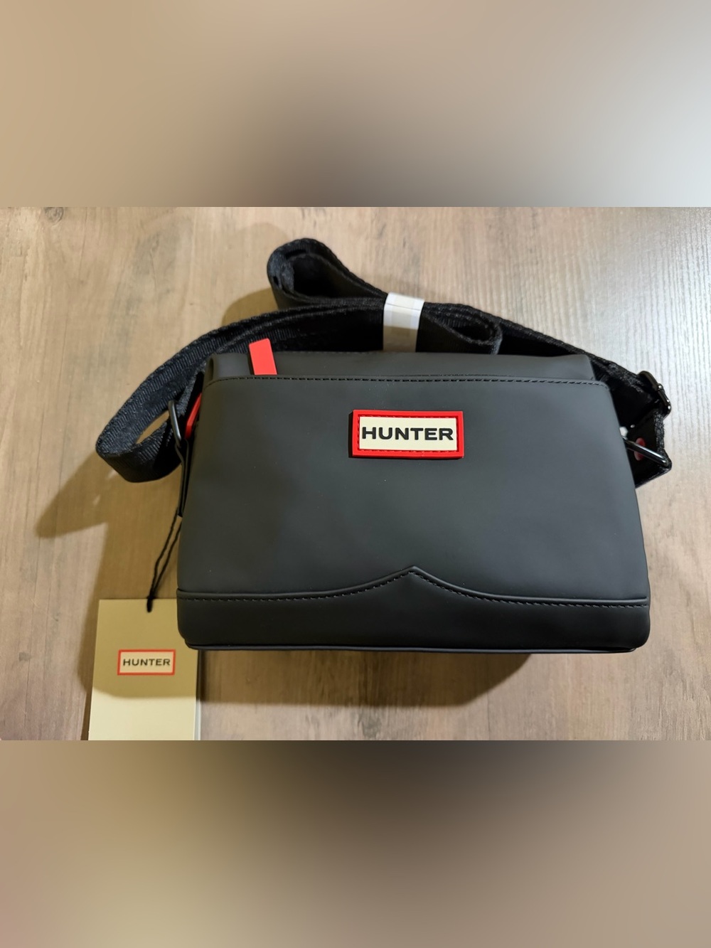 Hunter Black Messenger Bag with Red Logo Trim